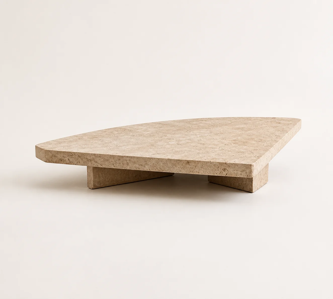 Mesa Limestone Table studio concept visual in veined warm limestone, shadowed plinth