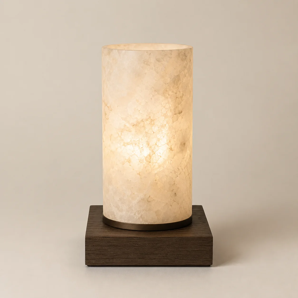 Qamar Alabaster Lamp studio concept visual in warm white stone, dark bronze