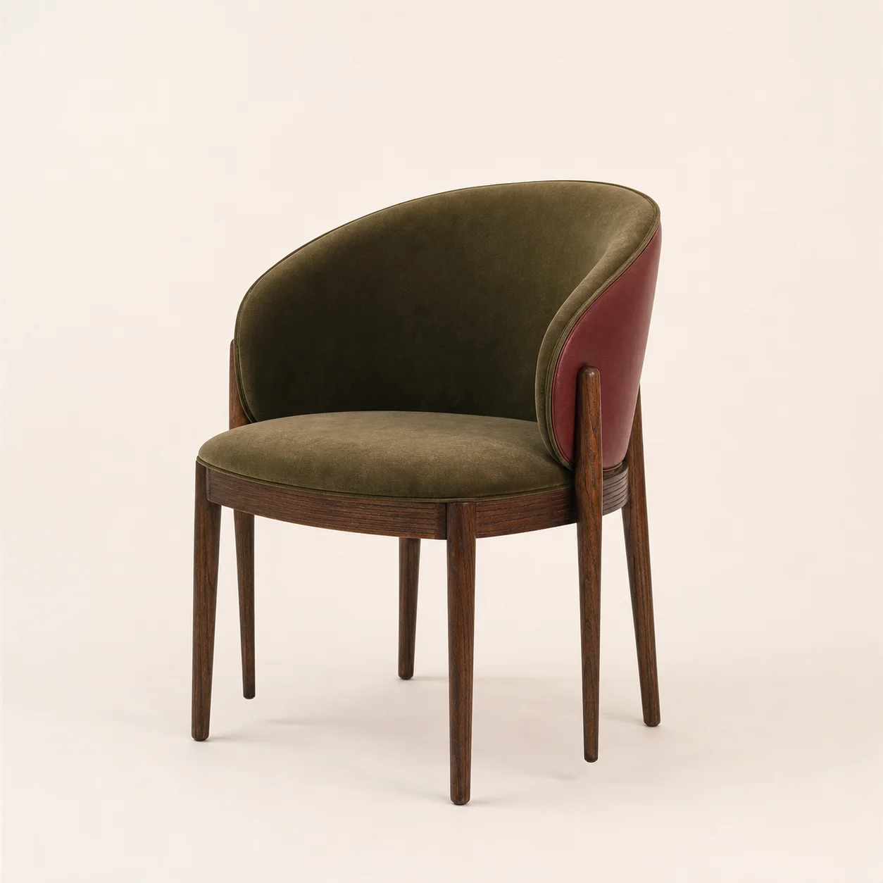 Brera Dining Armchair studio concept visual in walnut stain, moss velvet, oxblood outer back