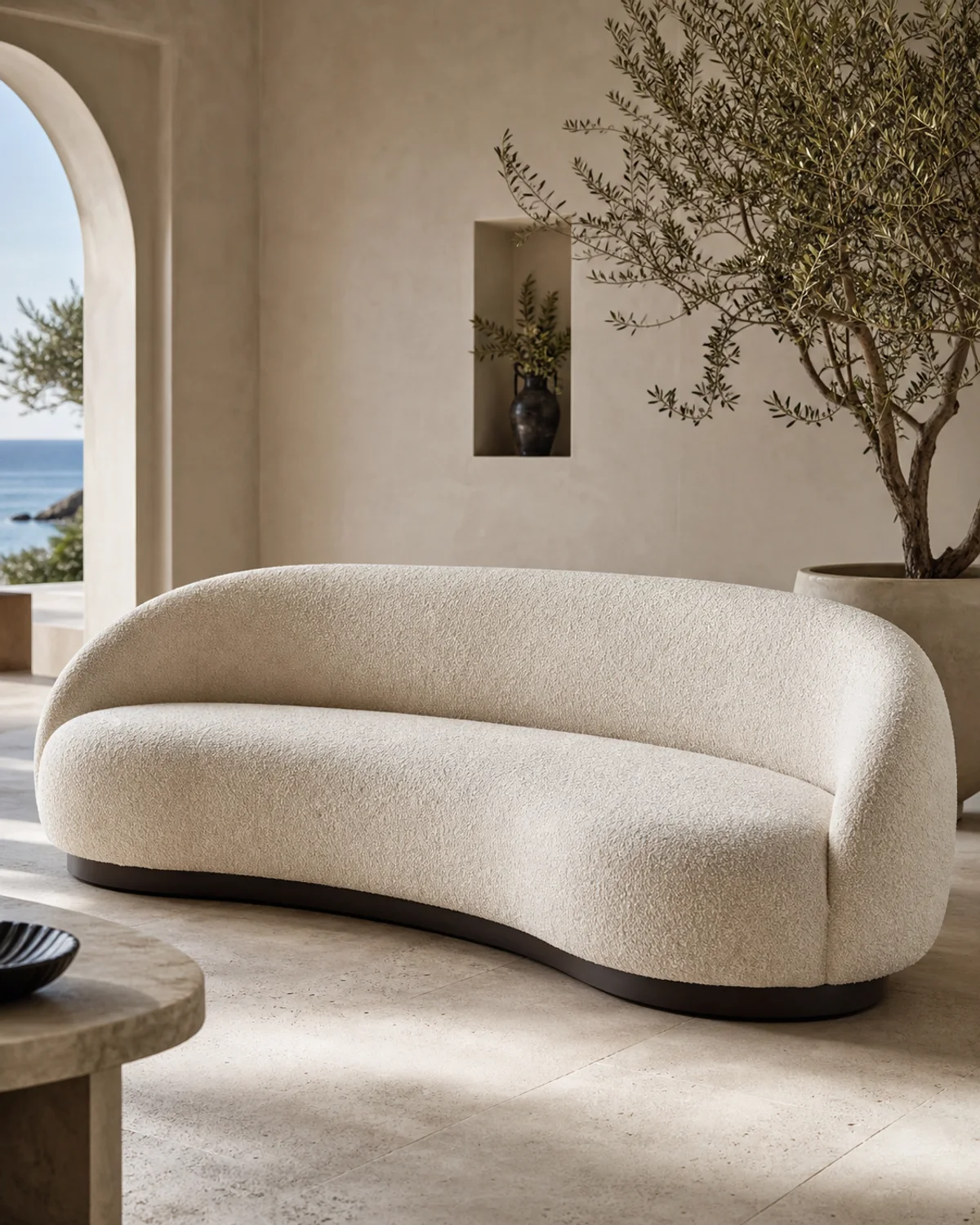Sirocco curved sofa in ivory textured upholstery
