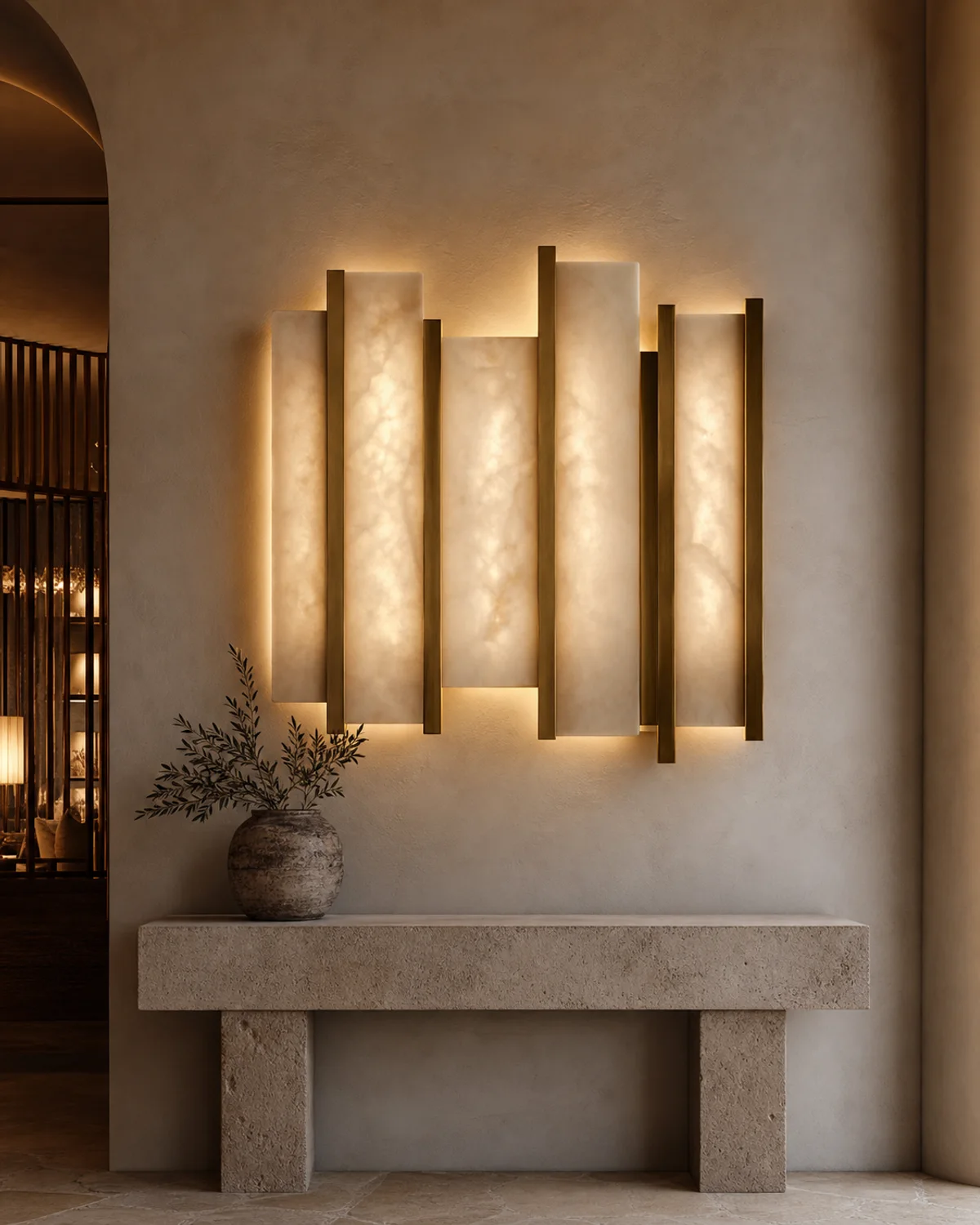 Halo architectural wall light with layered warm stone diffusers