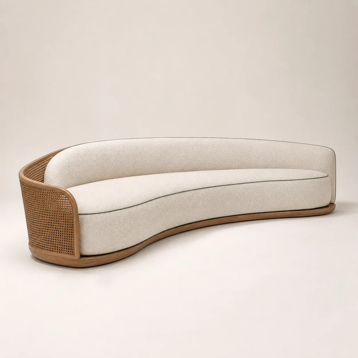 Atrium Curved Sofa studio concept visual in warm-white bouclé, teak shadow base, leaf-green piping