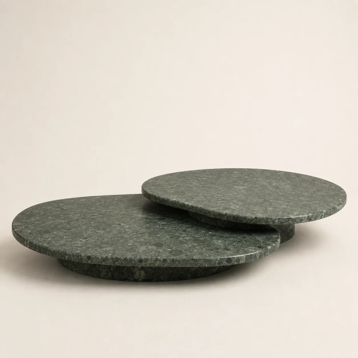 Pebble Green Stone Table studio concept visual in mottled green stone, softened edges
