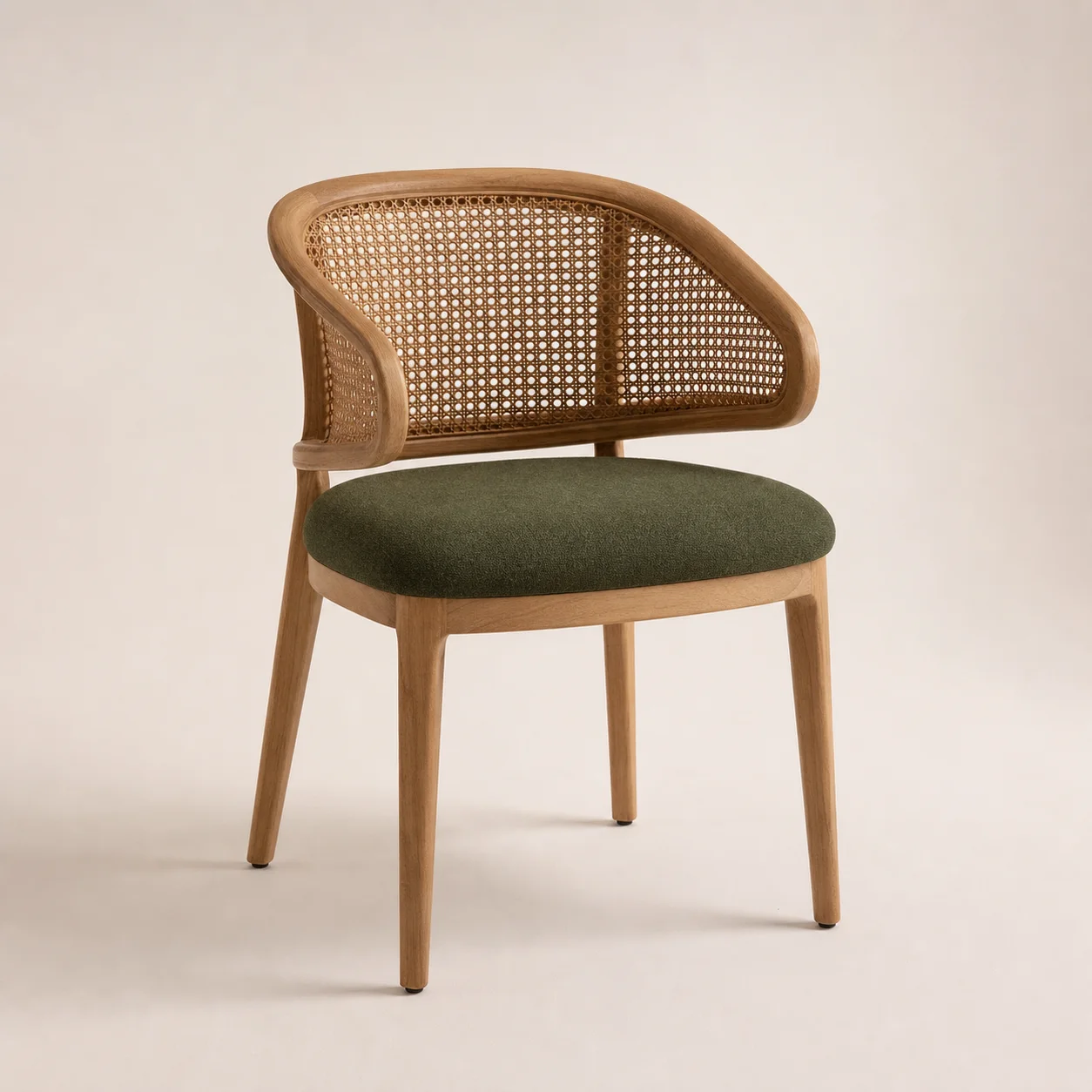 Reed Dining Chair studio concept visual in natural teak, honey cane, botanical-green seat
