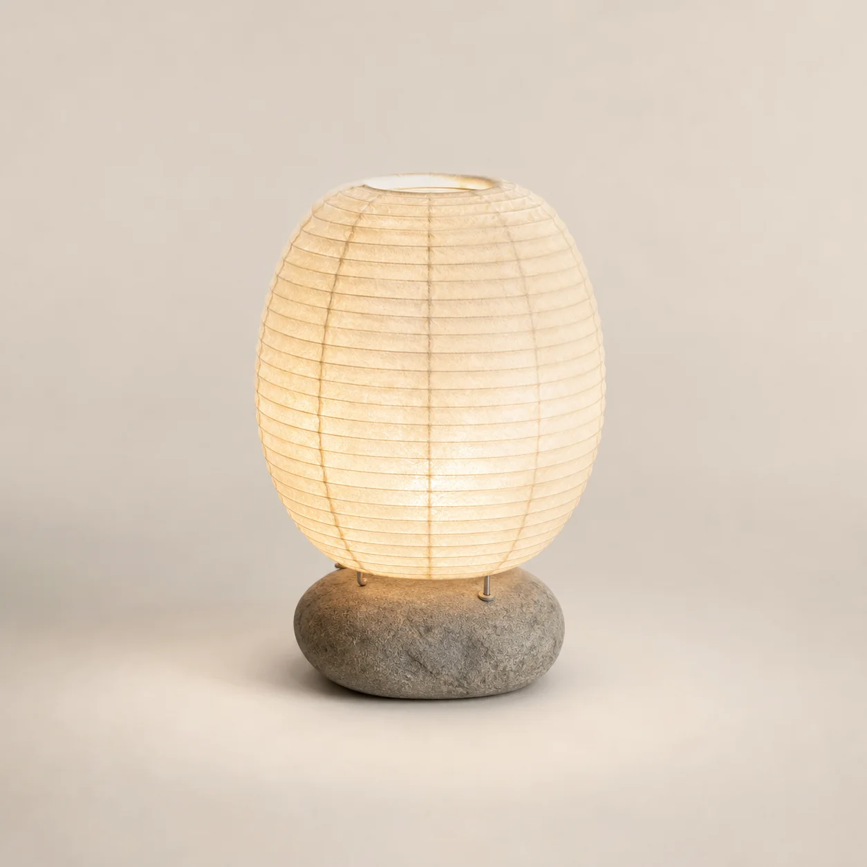 Mizu Paper Lamp studio concept visual in warm-white paper, grey river stone