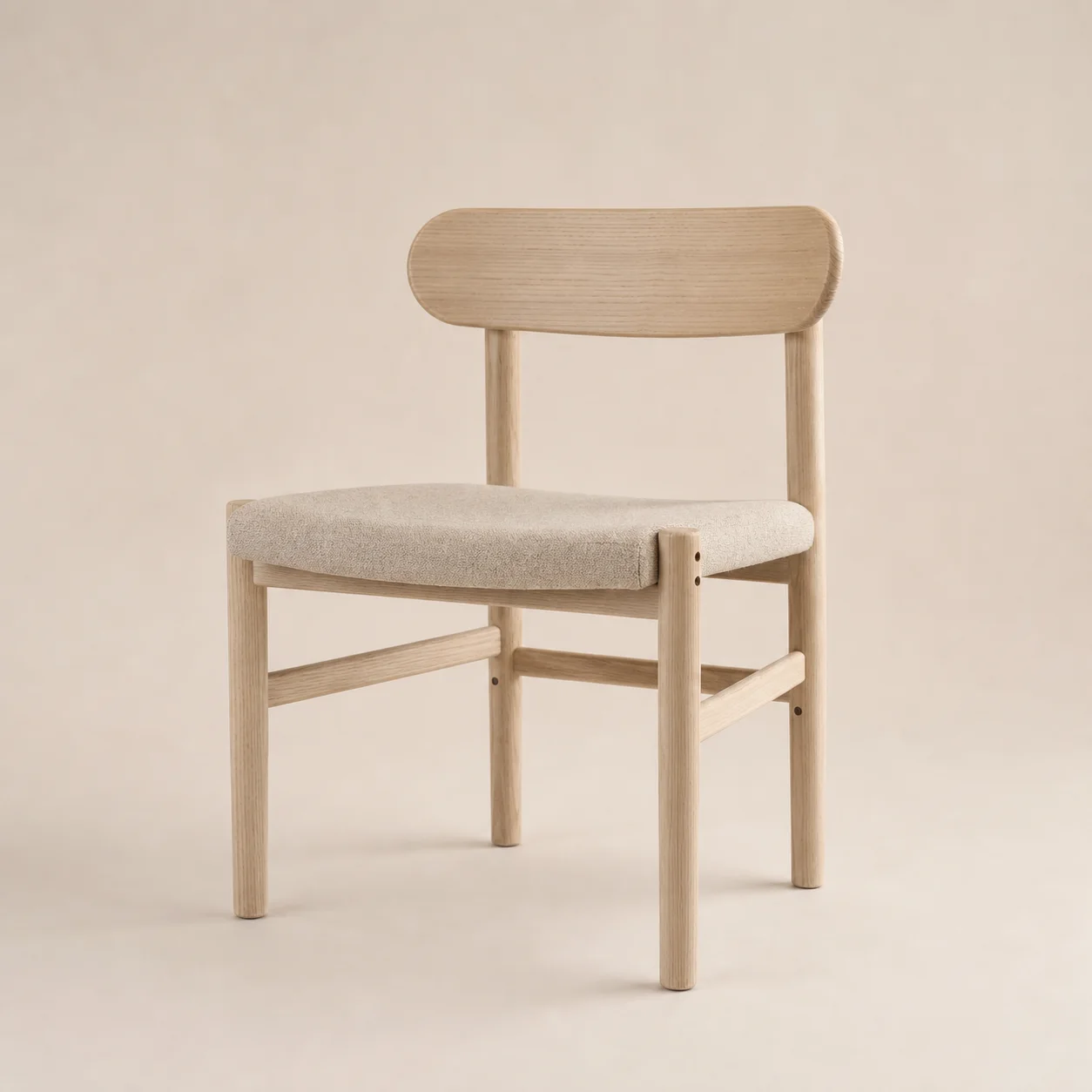 Raku Dining Chair studio concept visual in pale ash, flax textile