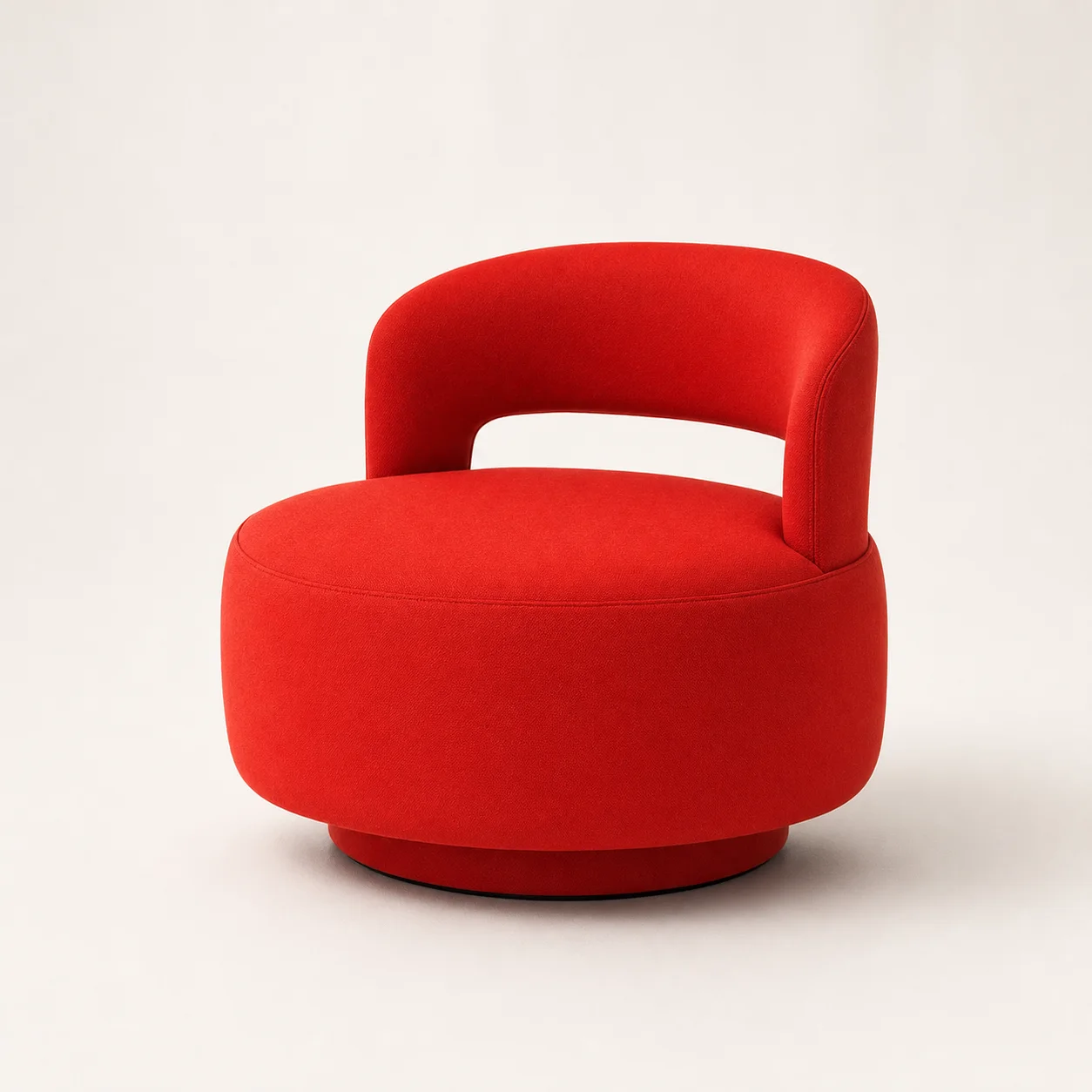 Pop Swivel Chair studio concept visual in tomato red textile, black recessed base