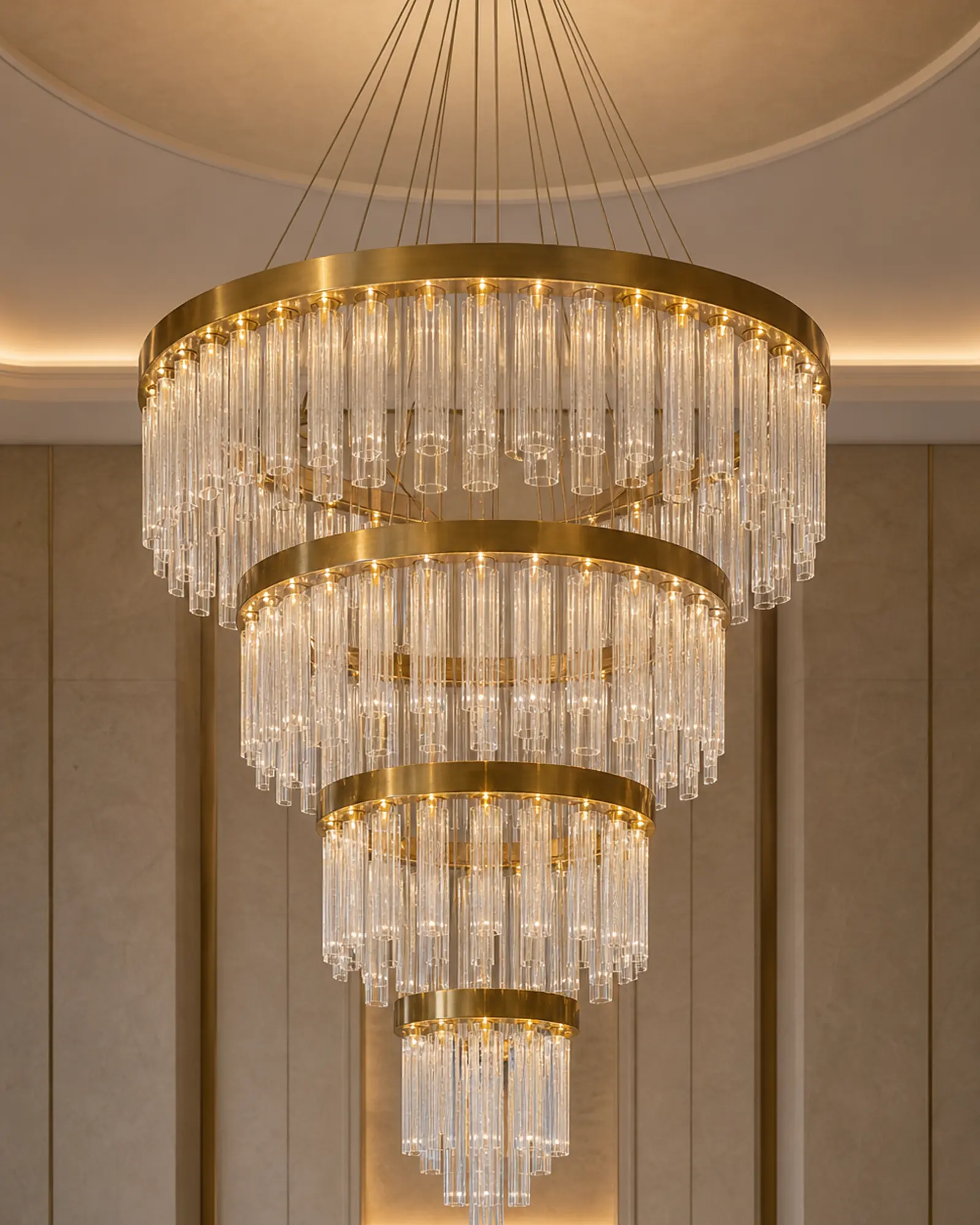 Chandelier profile - Bespoke brass and glass chandelier in a luxury hotel lobby